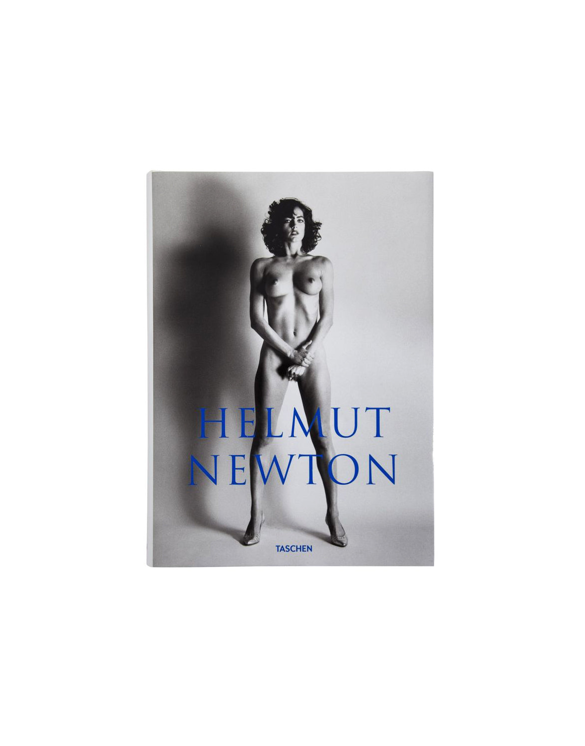 Curated coffee table books styled in a luxury interior by Peter Staunton Design