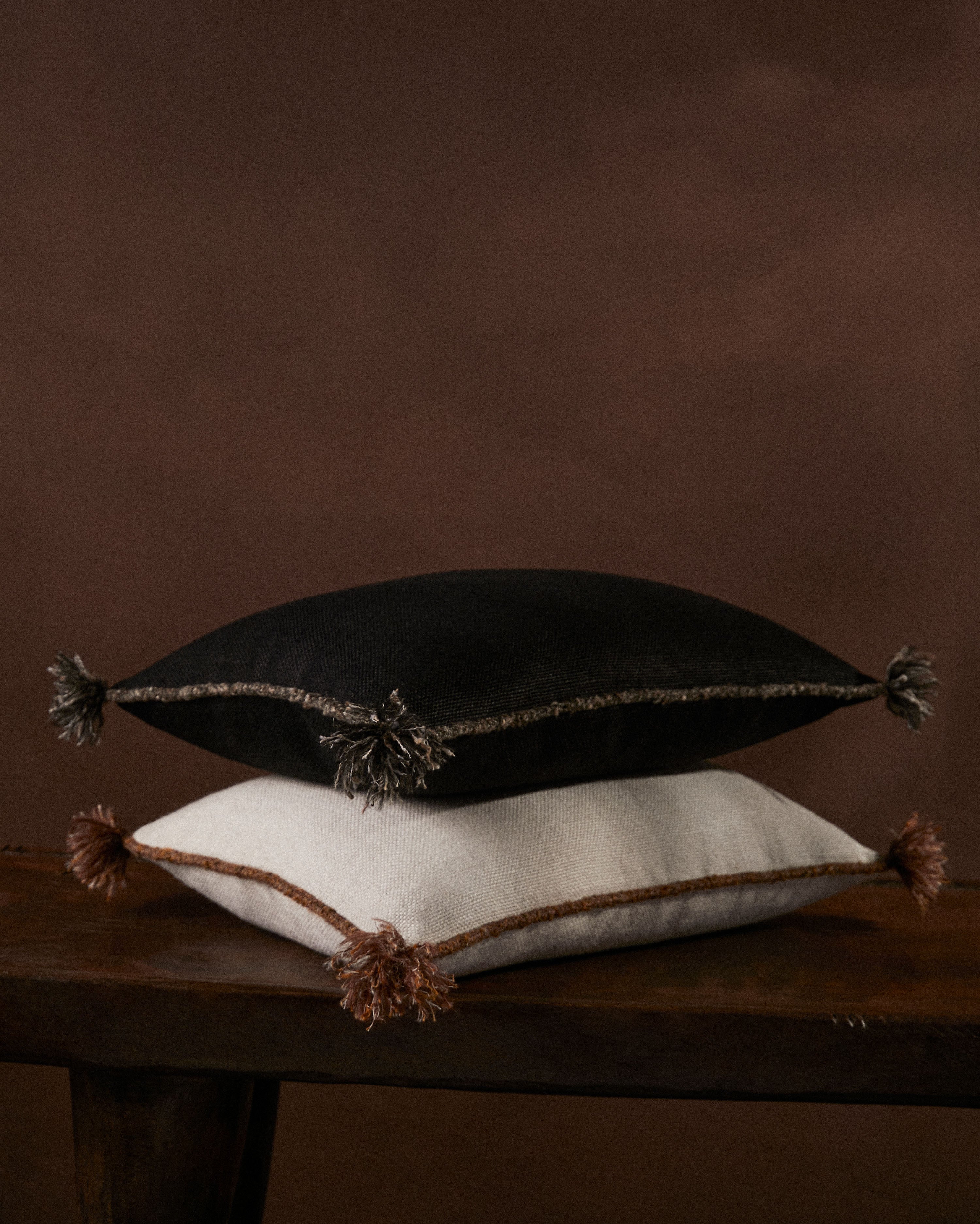 CAPE CUSHION WITH BRAIDED CORD TRIM - COAL - Peter Staunton Design Studio