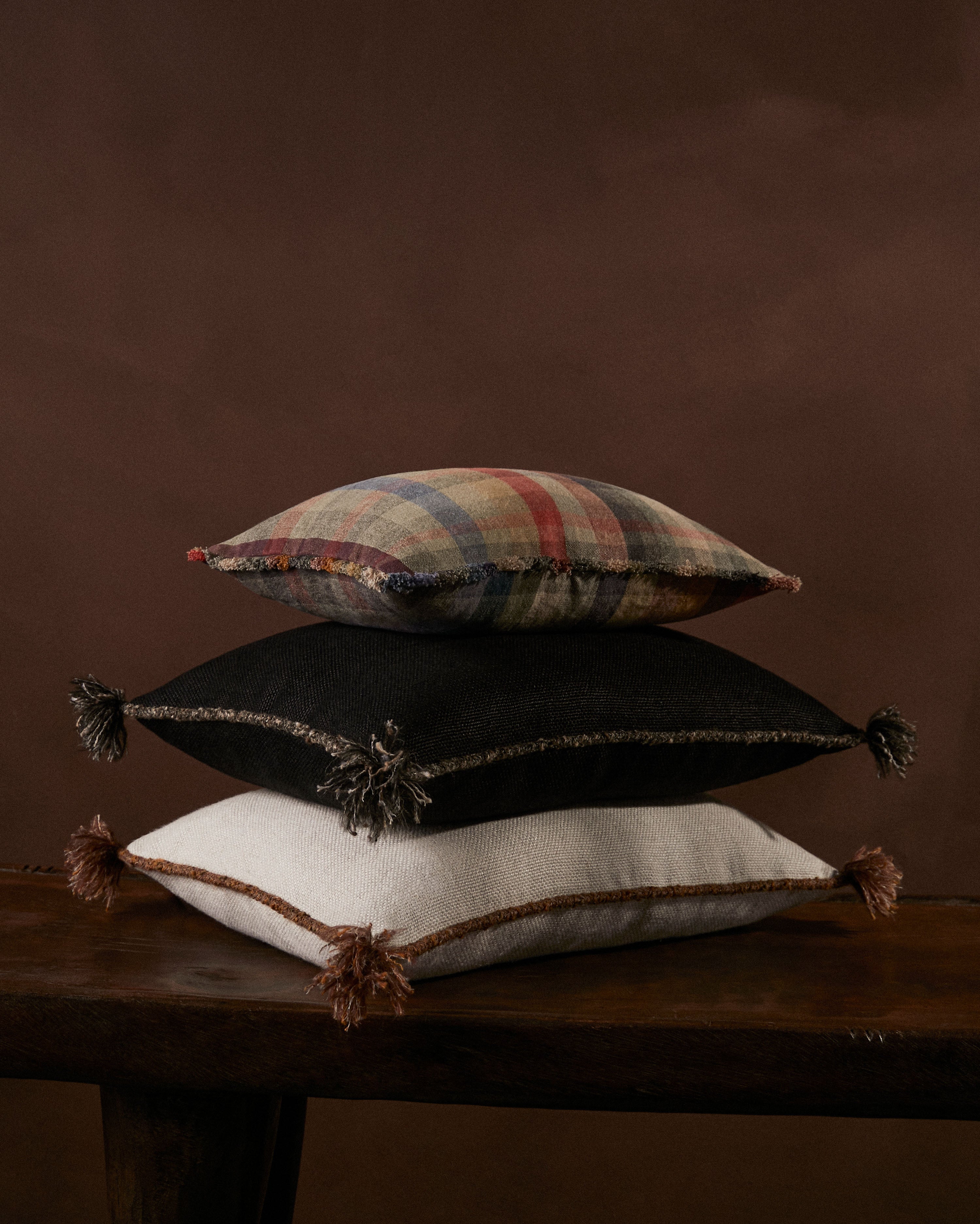CAPE CUSHION WITH BRAIDED CORD TRIM - COAL - Peter Staunton Design Studio
